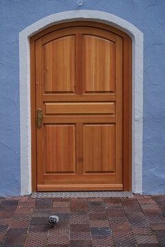 Close up of beautiful wooden front door in Germany