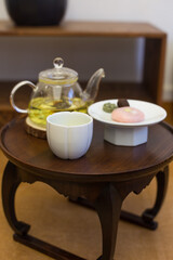 Fototapeta na wymiar flower tea in glass teapot in traditional cafe in Seoul.