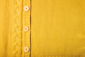 Background from knitted fabric of yellow color