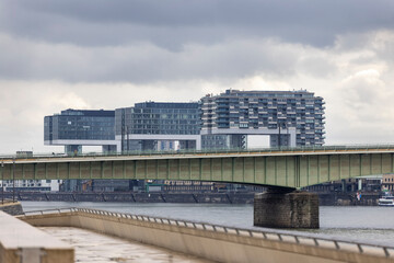 Fototapeta na wymiar Modern Cologne skyline near Rhine river in spring overcast weather