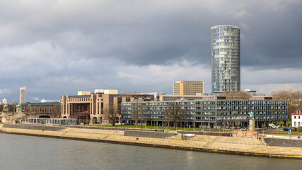 Cologne skyline and river banks in spring sunshine
