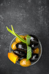 Olives on black background