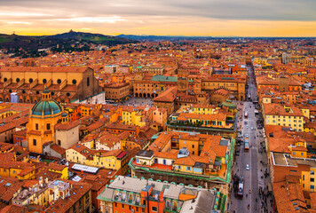 Aerial view of Bologna, Italy at sunset. Colorful sky over the historical city center - obrazy, fototapety, plakaty
