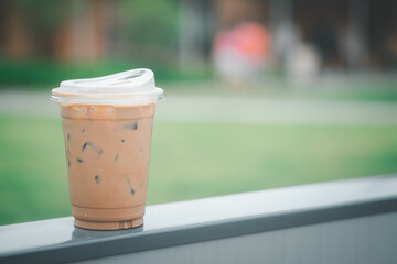 Iced coffee mocha in plastic glass with new lid design for don't use drink straw