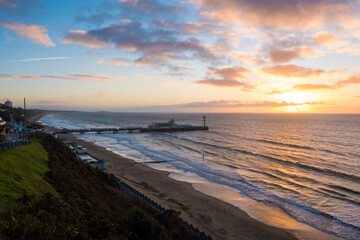 Aerial view of famous Pier in Bournemouth, England, UK during the sunrise