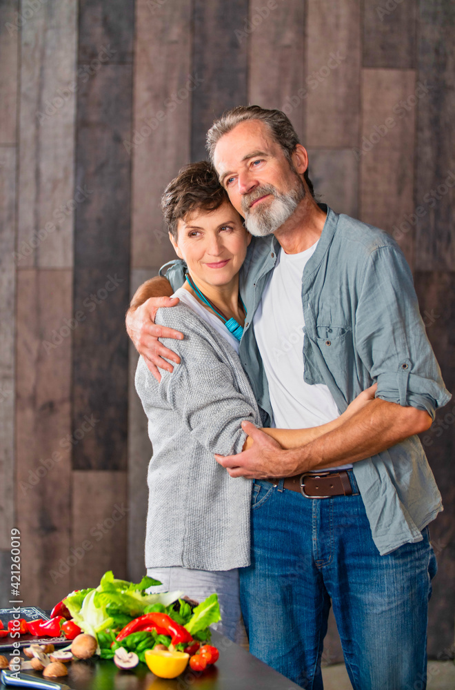 Wall mural aged couple in the kitchen