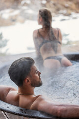 couple bathing in vats