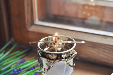 candle on the window sill