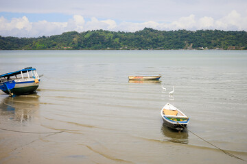 Fototapeta premium Boats on the beach sand