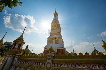 Fototapeta na wymiar The Pagoda of Wat Phra That Panom temple in Nakhon Phanom, Thailand in cloudy blue sky day with sunlight