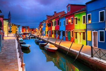 Fototapeta na wymiar Colourful evening houses on Burano island, Venice