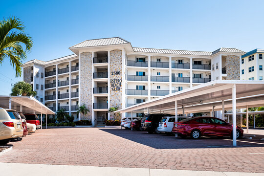 Fort Myers Beach, USA - April 29, 2018: Florida gulf of mexico coast with luxury expensive apartment condominium building Estero Beach Club in summer