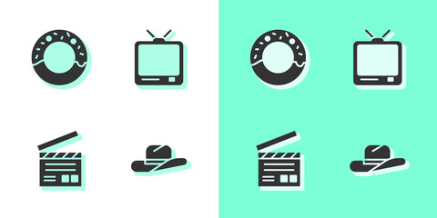 Set Western cowboy hat, Donut, Movie clapper and Retro tv icon. Vector