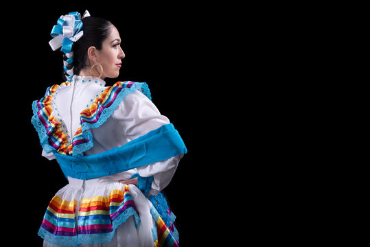 Latin woman dressed in a dress from Jalisco Mexico,