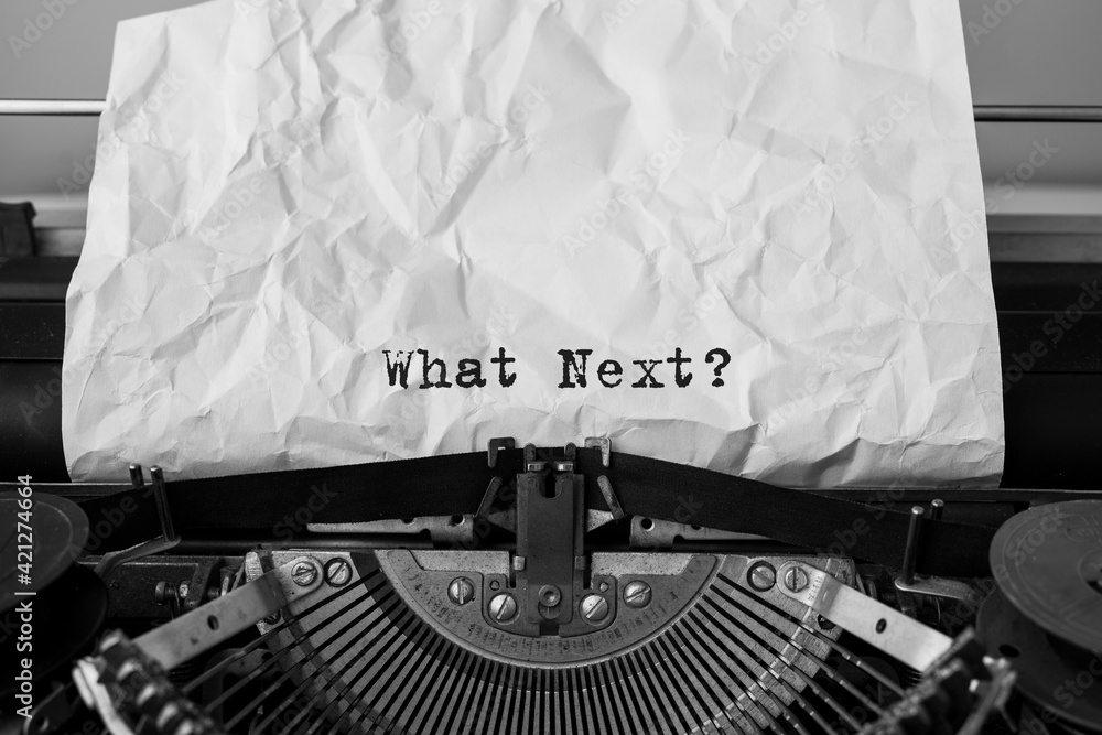 Poster text what next typed on retro typewriter