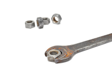 Rusty wrench on white background close-up. Tool, old, rare, vintage, macro, DIY 