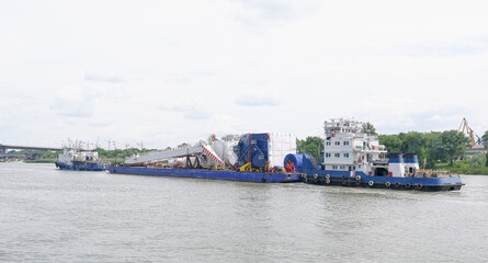 Transporting marine crane parts along the river in Rostov-on-Don