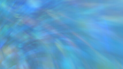 Fototapeta premium Abstract blue gradient blurred background with rainbow highlights.