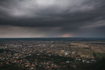 Fototapeta na wymiar View on the Vršac city under the rainy clouds