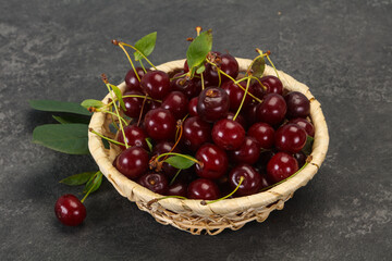 Sweet ripe cherry with leaves