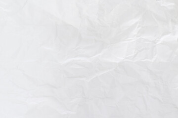 Crumpled white paper sheet texture