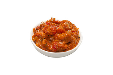 Vegetable stew in a bowl isolated on white background.