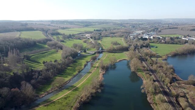 Aerial pull back view Chartham Kent countryside river Stour Canterbury English village scene