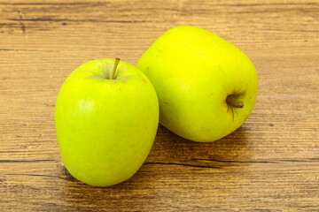 Two ripe green sweet apples