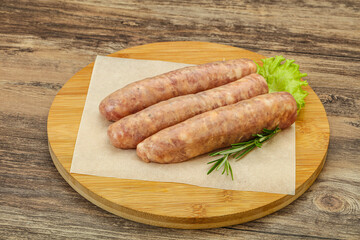 Raw pork meat sausages for grill