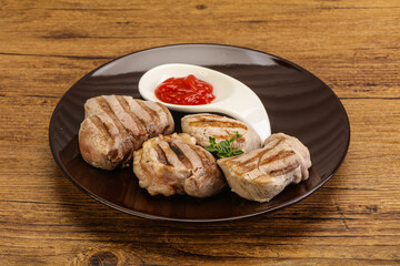 Grilled pork tenderlion with tomato sauce