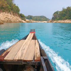 boat on the blue water river