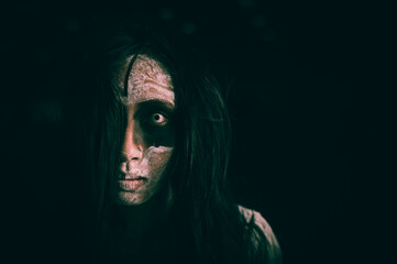Portrait of asian woman make up ghost face,Horror scene,Scary background,Halloween poster