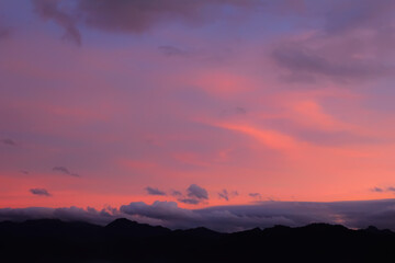 Silhouette of mountains and sunset in dream
