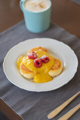 Delicious and beautiful breakfast for family on wooden table.