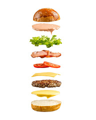 Isolated floating ham burger ingredients on the white background