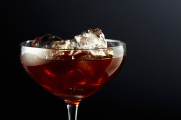 Iced coffee on a black background.