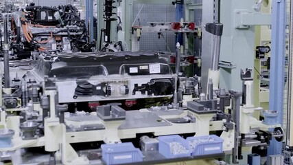 Robotic Equipment. Automated Machine. Commercial mass production at Automatic Conveyor belt of Factory Line.