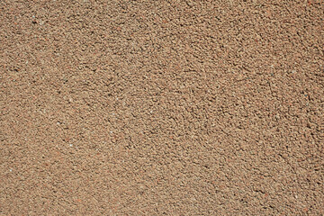 Granite wall. Small stone texture.