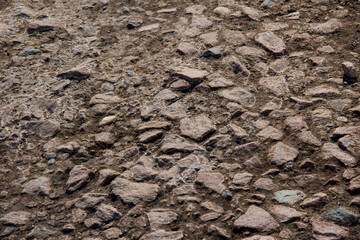 An old broken road paved with stone.