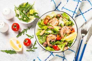 Seafood salad with leaves and vegetables.