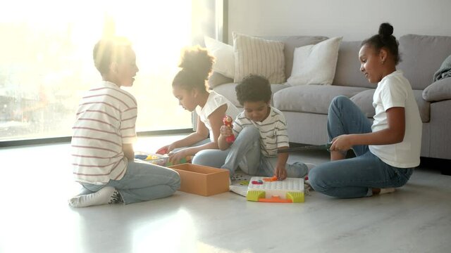 African American kids play educational toys at home