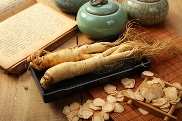 ginseng and slices ,medicine background.