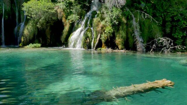 Amazing view on turquoise water. Location famous resort Plitvice Lakes National Park, Croatia, Europe. Scenic footage of popular tourist attraction. Discover the beauty of earth.