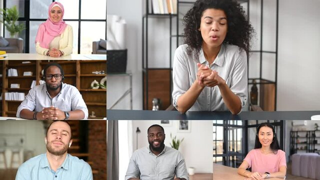 Video call concept. Smart and confident multiracial woman holding video conference, talking, diverse colleagues are listening. App for online communication of team, working and meeting on the distance