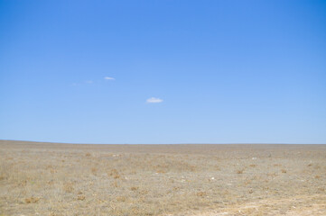 lonely clouds in the sky over the desert