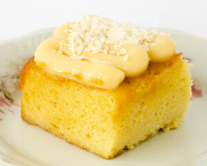 Slice of coco cake on a plate