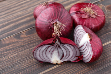 red onions on rustic wood