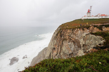 Fototapeta na wymiar Cape Roca on a foggy day, view from the rocks