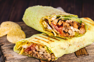 A cut kebab, shawarma, with grilled meat and vegetables. Delicious shawarma sandwich.