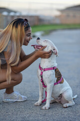 Close up portrait of smiling woman having a moment with her dog